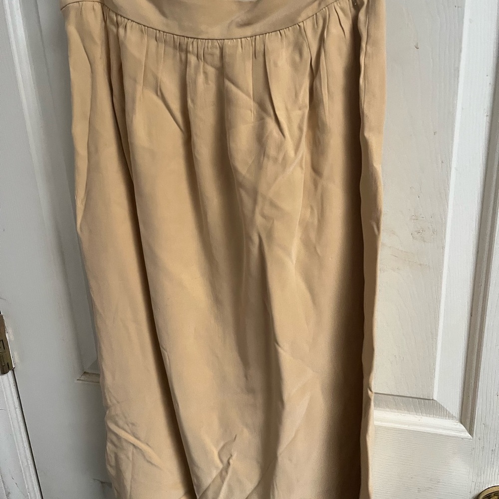 100% Silk Blouse and Skirt set. Beautiful long sleeves.